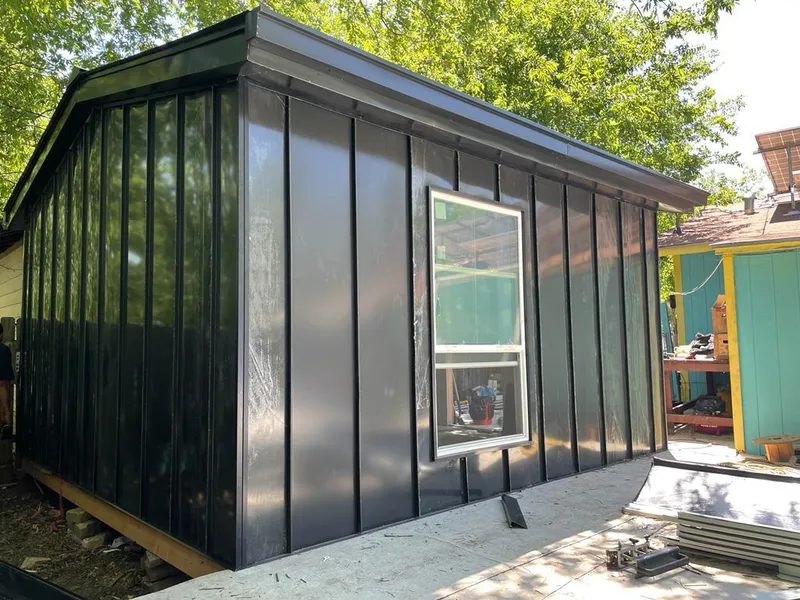 Black standing seam metal wall panels for Metal Roof Installation in Downey