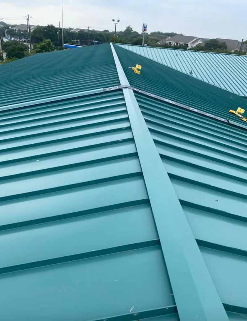Green commercial metal roof ridge and valley for Metal Roof Repair in Downey